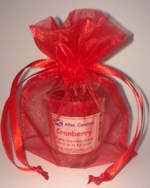  Cranberry Alba candle in a red gift bag 